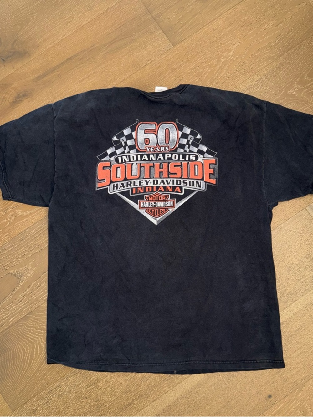 Harley-Davidson Black Tee with Orange 'Kicking Asphalt' Graphic